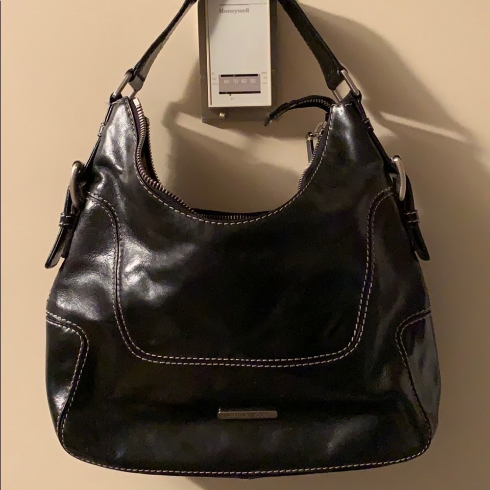 Michael Kor’s Black leather shoulder bag